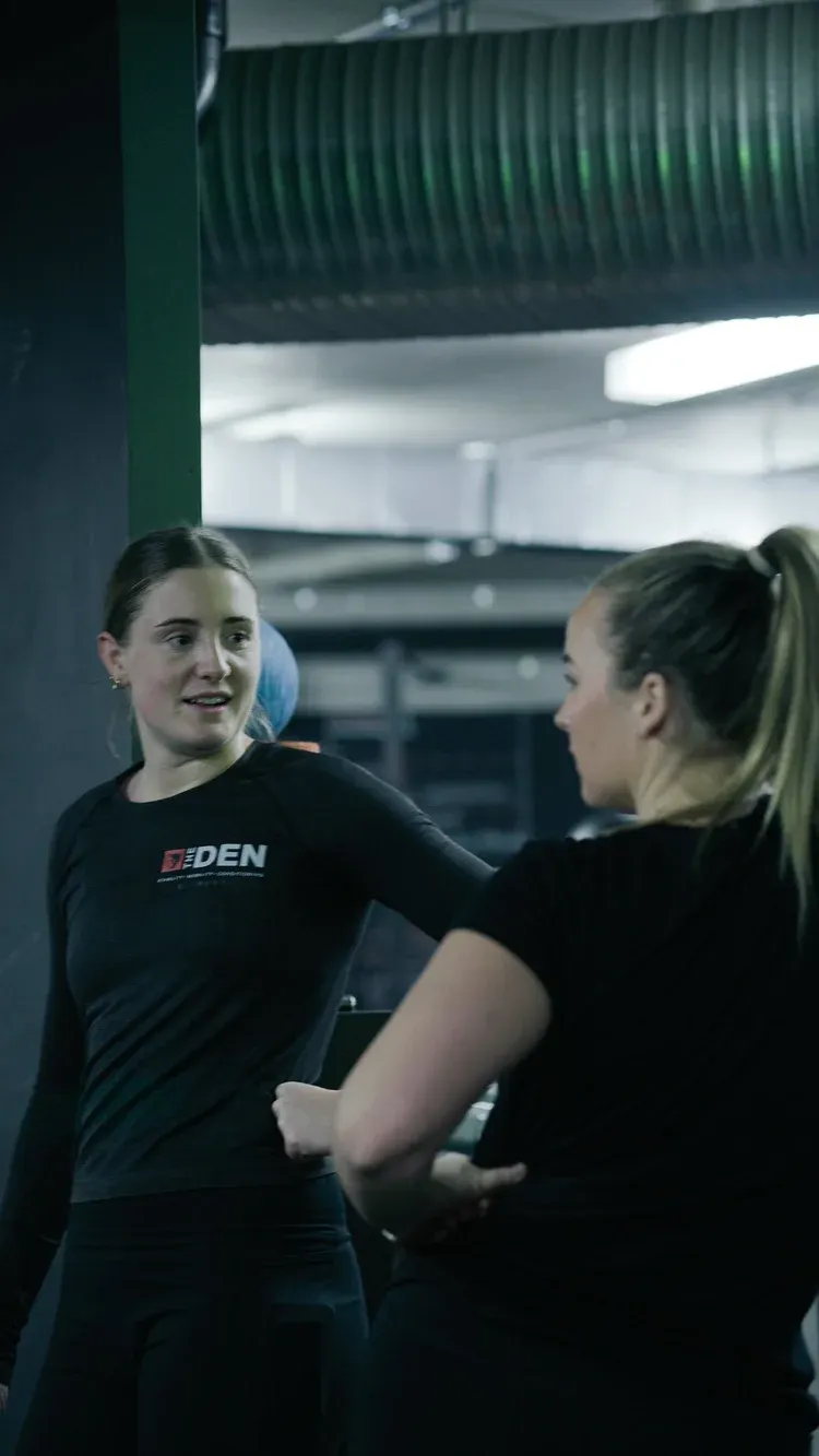 Maddie coaching a member